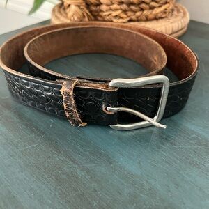 Genuine Leather Black Belt distressed belt with raised design and silver buckle.